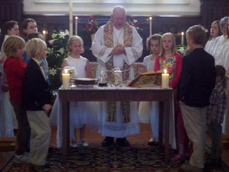Fr. Funston assisted at the Altar by children of St. Paul's Parish
